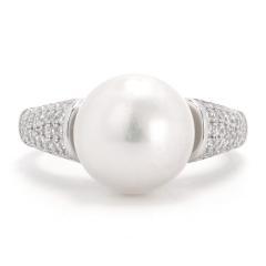 Strieborný prsteň s bielou perlou a zirkónmi